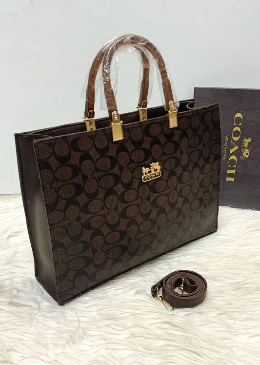 Classic Coach Signature Handbag – Dark Brown Monogram with Gold Details